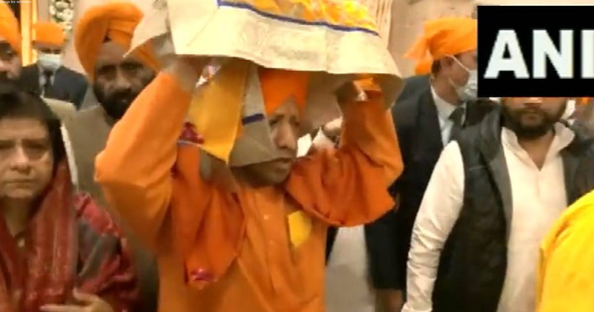 Yogi Adityanath carries Sikh holy book on Veer Bal Diwas